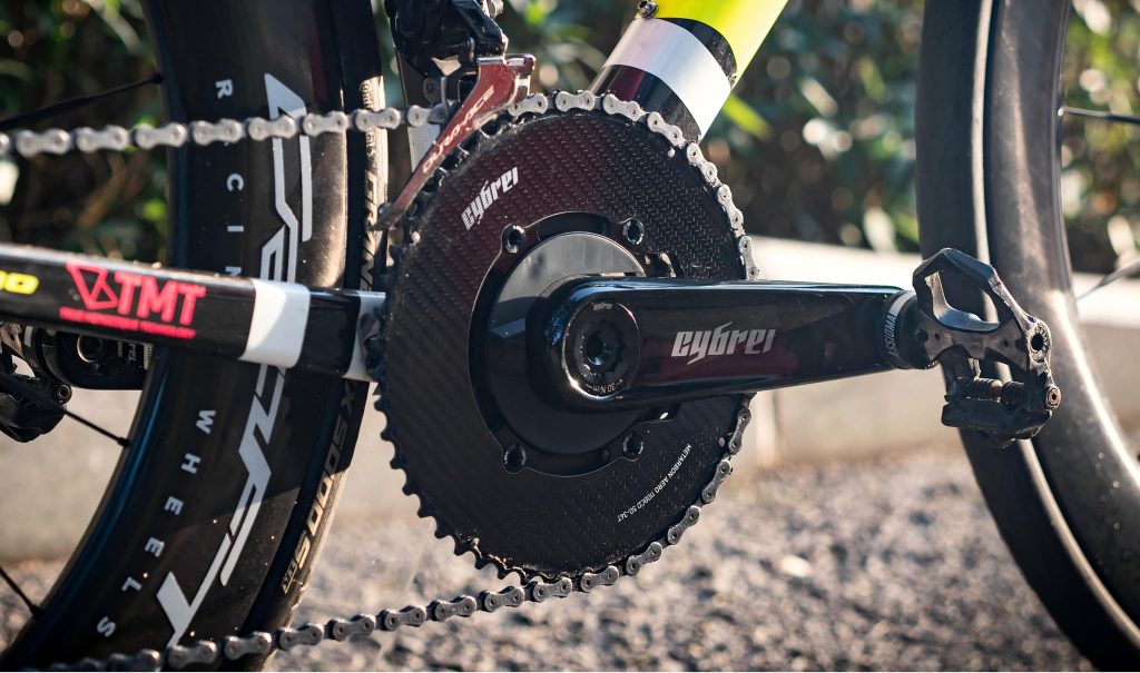 A Cybrei crankset with cybrei carbon fiber chainrings